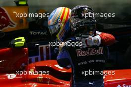 26.09.2010 Singapore, Singapore,  Sebastian Vettel (GER), Red Bull Racing with 1st place Fernando Alonso (ESP), Scuderia Ferrari - Formula 1 World Championship, Rd 15, Singapore Grand Prix, Sunday Podium