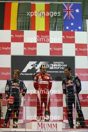 26.09.2010 Singapore, Singapore,  Sebastian Vettel (GER), Red Bull Racing with 1st place Fernando Alonso (ESP), Scuderia Ferrari and Mark Webber (AUS), Red Bull Racing - Formula 1 World Championship, Rd 15, Singapore Grand Prix, Sunday Podium
