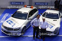 23.09.2010 Singapore, Singapore,  Dr Christian Deuringer, Vice president of Allianz SE, Bernie Ecclestone (GBR) and the Safety and medical cars - Formula 1 World Championship, Rd 15, Singapore Grand Prix, Thursday