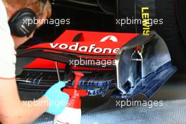 28.05.2010 Istanbul, Turkey McLaren Mercedes  mechanic use painting to work on aero - Formula 1 World Championship, Rd 7, Turkish Grand Prix, Friday Practice