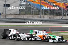 30.05.2010 Istanbul, Turkey,  Adrian Sutil (GER), Force India F1 Team, VJM-02 leads Kamui Kobayashi (JAP), BMW Sauber F1 Team, C29 - Formula 1 World Championship, Rd 7, Turkish Grand Prix, Sunday Race