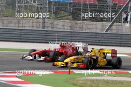30.05.2010 Istanbul, Turkey,  Fernando Alonso (ESP), Scuderia Ferrari, Vitaly Petrov (RUS), Renault F1 Team - Formula 1 World Championship, Rd 7, Turkish Grand Prix, Sunday Race