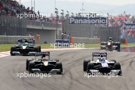 30.05.2010 Istanbul, Turkey,  Jarno Trulli (ITA), Lotus F1 Team, Rubens Barrichello (BRA), Williams F1 Team - Formula 1 World Championship, Rd 7, Turkish Grand Prix, Sunday Race