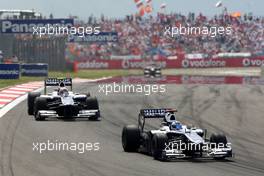 30.05.2010 Istanbul, Turkey,  Rubens Barrichello (BRA), Williams F1 Team, FW32 leads Nico Hulkenberg (GER), Williams F1 Team - Formula 1 World Championship, Rd 7, Turkish Grand Prix, Sunday Race