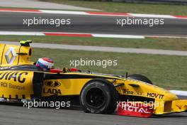 30.05.2010 Istanbul, Turkey,  Vitaly Petrov (RUS), Renault F1 Team with a puncture - Formula 1 World Championship, Rd 7, Turkish Grand Prix, Sunday Race