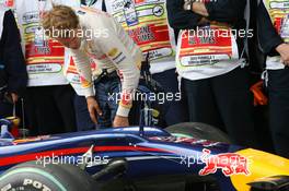 29.05.2010 Istanbul, Turkey,  Sebastian Vettel (GER), Red Bull Racing looks at his brakes - Formula 1 World Championship, Rd 7, Turkish Grand Prix, Saturday Qualifying