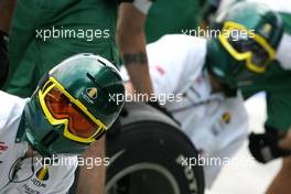 12.11.2010 Abu Dhabi, Abu Dhabi,  Lotus F1 Team mechanics - Formula 1 World Championship, Rd 19, Abu Dhabi Grand Prix, Friday Practice