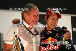 14.11.2010 Abu Dhabi, Abu Dhabi,  Helmut Marko (AUT), Red Bull Racing, Red Bull Advisor, Sebastian Vettel (GER), Red Bull Racing - Formula 1 World Championship, Rd 19, Abu Dhabi Grand Prix, Sunday Podium