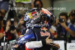 14.11.2010 Abu Dhabi, Abu Dhabi,  Sebastian Vettel (GER), Red Bull Racing and Jenson Button (GBR), McLaren Mercedes - Formula 1 World Championship, Rd 19, Abu Dhabi Grand Prix, Sunday Podium