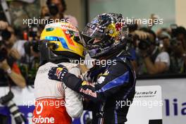 14.11.2010 Abu Dhabi, Abu Dhabi,  Lewis Hamilton (GBR), McLaren Mercedes and Sebastian Vettel (GER), Red Bull Racing - Formula 1 World Championship, Rd 19, Abu Dhabi Grand Prix, Sunday Podium