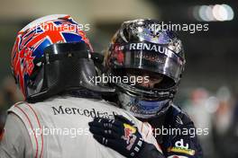 14.11.2010 Abu Dhabi, Abu Dhabi,  Sebastian Vettel (GER), Red Bull Racing, wins the race and Jenson Button (GBR), McLaren Mercedes  - Formula 1 World Championship, Rd 19, Abu Dhabi Grand Prix, Sunday Podium