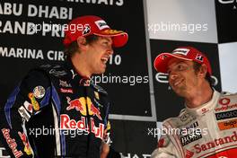 14.11.2010 Abu Dhabi, Abu Dhabi,  Sebastian Vettel (GER), Red Bull Racing, Jenson Button (GBR), McLaren Mercedes - Formula 1 World Championship, Rd 19, Abu Dhabi Grand Prix, Sunday Podium