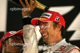 14.11.2010 Abu Dhabi, Abu Dhabi,  Lewis Hamilton (GBR), McLaren Mercedes and Jenson Button (GBR), McLaren Mercedes  - Formula 1 World Championship, Rd 19, Abu Dhabi Grand Prix, Sunday Podium