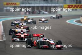 14.11.2010 Abu Dhabi, Abu Dhabi,  Jenson Button (GBR), McLaren Mercedes leads Fernando Alonso (ESP), Scuderia Ferrari - Formula 1 World Championship, Rd 19, Abu Dhabi Grand Prix, Sunday Race