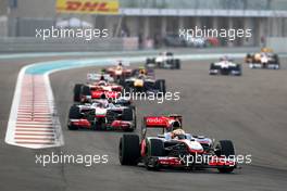 14.11.2010 Abu Dhabi, Abu Dhabi,  Lewis Hamilton (GBR), McLaren Mercedes, MP4-25 leads Jenson Button (GBR), McLaren Mercedes, MP4-25 - Formula 1 World Championship, Rd 19, Abu Dhabi Grand Prix, Sunday Race