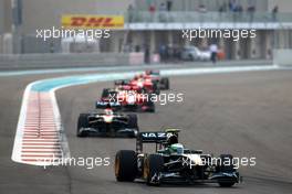 14.11.2010 Abu Dhabi, Abu Dhabi,  Heikki Kovalainen (FIN), Lotus F1 Team, T127 leads Jarno Trulli (ITA), Lotus F1 Team, T127 - Formula 1 World Championship, Rd 19, Abu Dhabi Grand Prix, Sunday Race