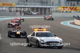 14.11.2010 Abu Dhabi, Abu Dhabi,  The safety car leads Sebastian Vettel (GER), Red Bull Racing, RB6 - Formula 1 World Championship, Rd 19, Abu Dhabi Grand Prix, Sunday Race