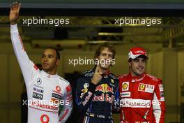 13.11.2010 Abu Dhabi, Abu Dhabi,  Lewis Hamilton (GBR), McLaren Mercedes with pole man Sebastian Vettel (GER), Red Bull Racing and Fernando Alonso (ESP), Scuderia Ferrari - Formula 1 World Championship, Rd 19, Abu Dhabi Grand Prix, Saturday Qualifying