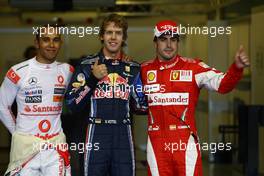 13.11.2010 Abu Dhabi, Abu Dhabi,  Lewis Hamilton (GBR), McLaren Mercedes with pole man Sebastian Vettel (GER), Red Bull Racing and Fernando Alonso (ESP), Scuderia Ferrari - Formula 1 World Championship, Rd 19, Abu Dhabi Grand Prix, Saturday Qualifying