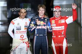 13.11.2010 Abu Dhabi, Abu Dhabi,  Lewis Hamilton (GBR), McLaren Mercedes with pole man Sebastian Vettel (GER), Red Bull Racing and Fernando Alonso (ESP), Scuderia Ferrari - Formula 1 World Championship, Rd 19, Abu Dhabi Grand Prix, Saturday Qualifying