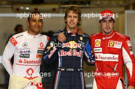 13.11.2010 Abu Dhabi, Abu Dhabi,  Lewis Hamilton (GBR), McLaren Mercedes with pole man Sebastian Vettel (GER), Red Bull Racing and Fernando Alonso (ESP), Scuderia Ferrari - Formula 1 World Championship, Rd 19, Abu Dhabi Grand Prix, Saturday Qualifying