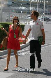 11.11.2010 Abu Dhabi, Abu Dhabi,  Jessica Michibata (JPN) girlfriend of Jenson Button (GBR) and Jenson Button (GBR), McLaren Mercedes - Formula 1 World Championship, Rd 19, Abu Dhabi Grand Prix, Thursday