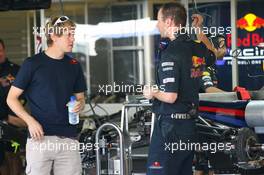 11.11.2010 Abu Dhabi, Abu Dhabi,  Sebastian Vettel (GER), Red Bull Racing looking at his car - Formula 1 World Championship, Rd 19, Abu Dhabi Grand Prix, Thursday