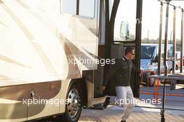 01.02.2010 Valencia, Spain,  Michael Schumacher (GER), Mercedes GP, leaves the motorhome in the paddock where he stayed overnight - Formula 1 Testing, Valencia