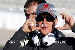 01.02.2010 Valencia, Spain,  Michael Schumacher (GER), Mercedes GP pretends to take photos of the photographers - Formula 1 Testing, Valencia