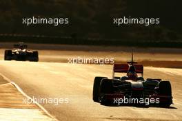 01.02.2010 Valencia, Spain,  Gary Paffett (GBR), Test Driver, McLaren Mercedes and Michael Schumacher (GER), Mercedes GP  - Formula 1 Testing, Valencia