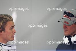 01.02.2010 Valencia, Spain,  Nico Rosberg (GER), Mercedes GP, Michael Schumacher (GER), Mercedes GP- Formula 1 Testing, Valencia