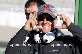 01.02.2010 Valencia, Spain,  Michael Schumacher (GER), Mercedes GP pretends to take photos of the photographers - Formula 1 Testing, Valencia