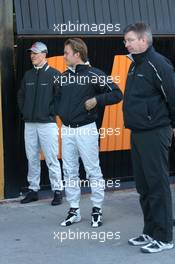 01.02.2010 Valencia, Spain,  Michael Schumacher (GER), Mercedes GP, Ross Brawn (GBR) Team Principal, Mercedes GP and Nico Rosberg (GER), Mercedes GP  - Formula 1 Testing, Valencia