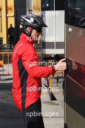 02.02.2010 Valencia, Spain,  Michael Schumacher (GER), Mercedes GP, returns from a bike ride - Formula 1 Testing, Valencia