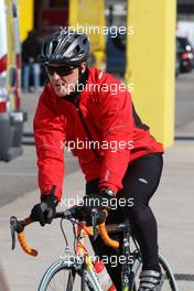 02.02.2010 Valencia, Spain,  Michael Schumacher (GER), Mercedes GP, returns from a bike ride - Formula 1 Testing, Valencia