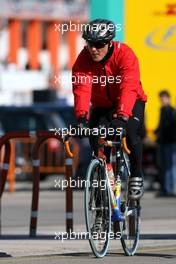 02.02.2010 Valencia, Spain,  Michael Schumacher (GER), Mercedes GP returns from his bike run - Formula 1 Testing, Valencia