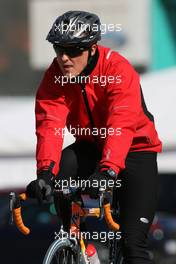 02.02.2010 Valencia, Spain,  Michael Schumacher (GER), Mercedes GP returns from his bike run - Formula 1 Testing, Valencia