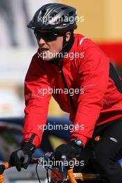 02.02.2010 Valencia, Spain,  Michael Schumacher (GER), Mercedes GP returns from his bike run - Formula 1 Testing, Valencia