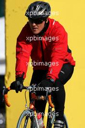 02.02.2010 Valencia, Spain,  Michael Schumacher (GER), Mercedes GP returns from his bike run - Formula 1 Testing, Valencia