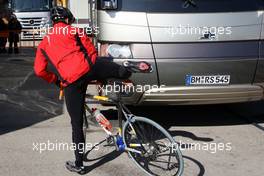 02.02.2010 Valencia, Spain,  Michael Schumacher (GER), Mercedes GP, returns from a bike ride - Formula 1 Testing, Valencia