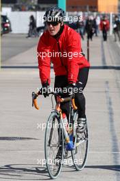 02.02.2010 Valencia, Spain,  Michael Schumacher (GER), Mercedes GP, returns from a bike ride - Formula 1 Testing, Valencia