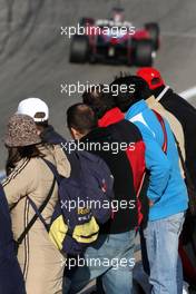 02.02.2010 Valencia, Spain,  Fans watch Felipe Massa (BRA), Scuderia Ferrari - Formula 1 Testing, Valencia