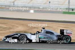 03.02.2010 Valencia, Spain,  Michael Schumacher (GER), Mercedes GP, W01, in a black helmet - Formula 1 Testing, Valencia