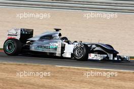 03.02.2010 Valencia, Spain,  Michael Schumacher (GER), Mercedes GP, W01, in a black helmet - Formula 1 Testing, Valencia