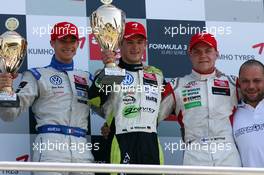 24.04.2010 Hockenheim, Germany,  Podium, Marco Wittmann (GER), Signature, Portrait(1st, center) Edoardo Mortara (ITA), Signature, Portrait (2nd, left), Valtteri Bottas (FIN), ART Grand Prix, Portrait (3rd, right) - F3 Euro Series 2010 at Hockenheimring, Hockenheim, Germany