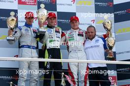 24.04.2010 Hockenheim, Germany,  Podium, Marco Wittmann (GER), Signature, Portrait(1st, center) Edoardo Mortara (ITA), Signature, Portrait (2nd, right), Valtteri Bottas (FIN), ART Grand Prix, Portrait (3rd, left) - F3 Euro Series 2010 at Hockenheimring, Hockenheim, Germany