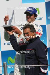 08.05.2010 Barcelona, Spain,  Carlos Sainz Jr. (ESP), Eurointernational and Dr. Mario Theissen (GER), BMW Motorsport Director  - Formula BMW Europe 2010, Rd 01 & 02, Barcelona, Saturday Podium