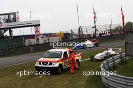 06.06.2010 Zandvoort, The Nederlands,  Jack Harvey (GBR), Fortec Motorsports passing the stranded car of Marc Coleselli (AUT), Eifelland Racing - Formula BMW Europe 2010, Rd 03 & 04, Zandvoort, Race 3