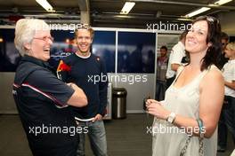 06.06.2010 Zandvoort, The Nederlands,  BMW invited students of the Formula Student Championship to have a look in the Red Bull F1 garage and to have a meet and greet with Sebastian Vettel . Vettel here with (left) Ann Bradshaw of BMW and (right) Lee McKenzie BBC F1 commentator- Formula BMW Europe 2010, Rd 03 & 04, Zandvoort, Sunday