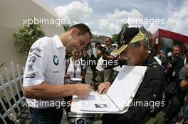04-11.06.2010 Le Mans, France, Adminstrative Check and Scrutineering,  #78 BMW Motorsport BMW M3: Joerg Mueller - 24 Hour of Le Mans 2010